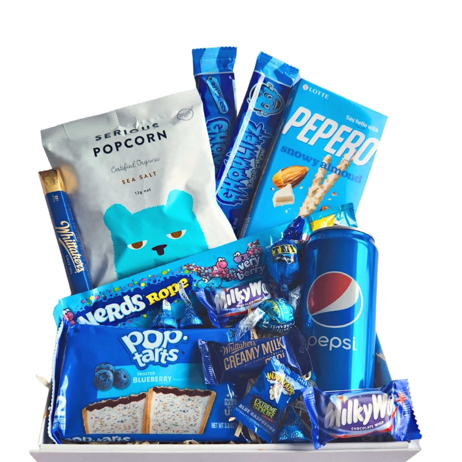 The snack box is filled with tasty treats! It will help with the blues and cheer up anyone’s day! A unique gift, or just for you…  What’s in the Box?  Nerds ropes berry x1 Whittaker’s sante bar x1 Poptart assorted flavours x1 Pepsi can x1 Mini milky way x2 Pepero x1 Whittaker's mini slab x1 Warhead x1 Hershey kisses x3 Zombie chews blueberry x2 Lindt truffle ball x1 TNT lollipop x1 Serious Popcorn sea salt 12g x1