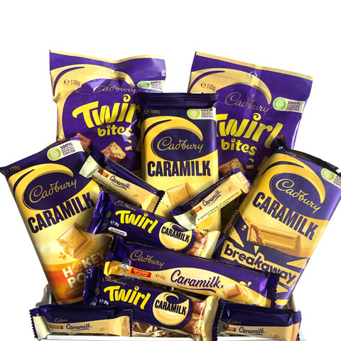 Calling all Caramilk lovers: This chocolate box is filled with all sorts of caramilk goodies, everything a caramilk lover dreams of! Perfect for a gift, or to enjoy yourself!   What’s in the Box?  Caramilk twirls bites x2 Caramilk chocolate bar x1 Caramilk twirl chocolate bar x2 Caramilk breakaway block x1 Caramilk chocolate block x1 Caramilk hokey pokey block x1 Caramilk minis x4