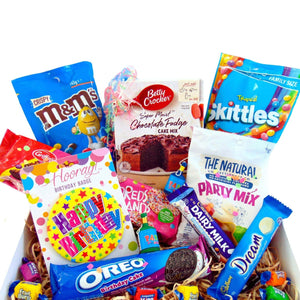 This delicious gift box is bound to make someone smile on their birthday. Over filled with scrumptious treats, a perfect gift for anyone’s birthday.   What’s in the Box?   Betty Crocker cake mix x1 Griffins hundreds and thousands cookies x1 Naturals lolly party bag x1 M&Ms crispy x1 Skittles Tropical x1 Cadbury birthday bar x1 Oreo birthday cookies x1 Cadbury dream bar x1 Fruit bursts x6 and more