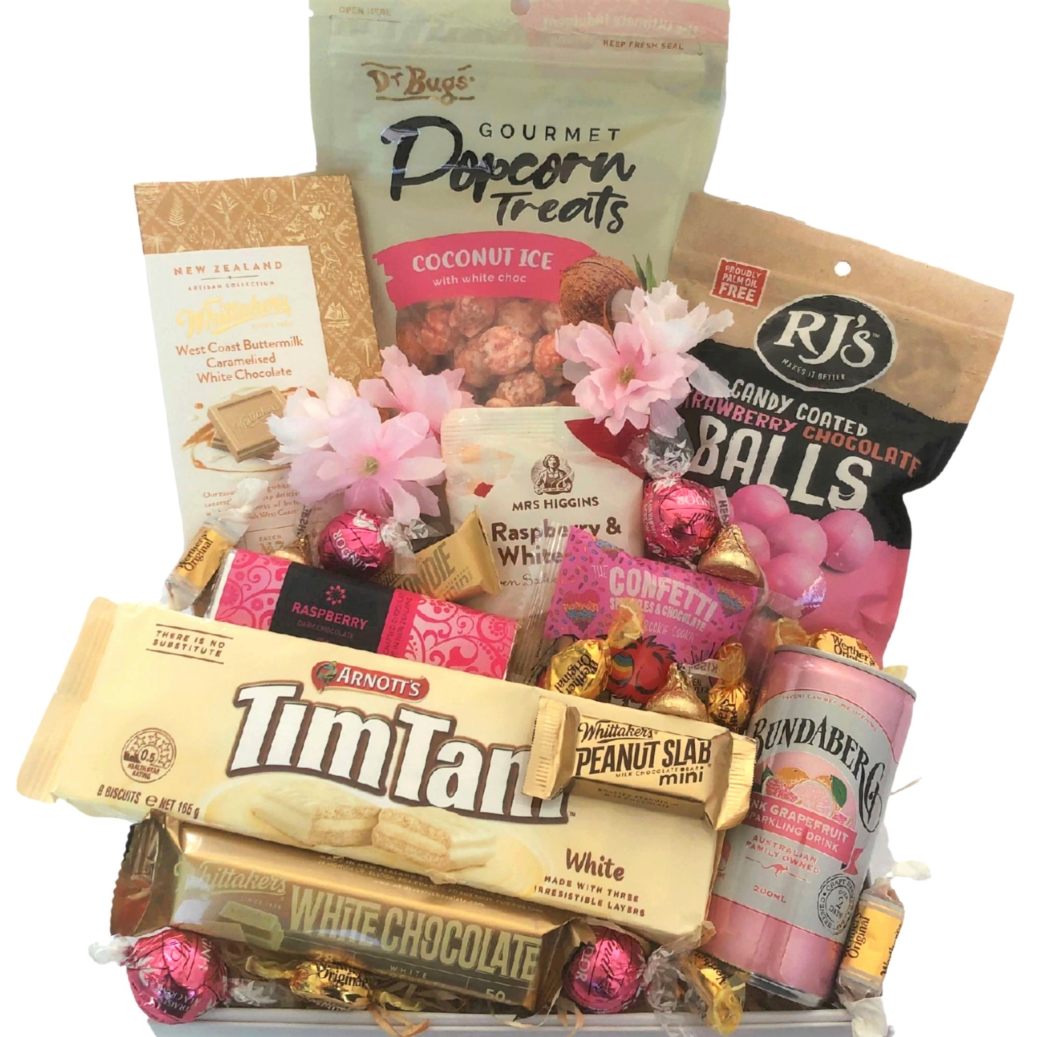 This pretty in pink gift box is filled with sweet treats that would be sure to make anyone’s day! Whittaker’s artisan block caramelised buttermilk white chocolate x1 Chocolate traders dark chocolate raspberry bar x1 Dr Bugs gourmet coconut ice popcorn x1 RJ’S chocolate balls x1 White chocolate Tim Tam’s Mrs Higgins raspberry and white chocolate cookie x1 Bundaberg grapefruit can x1 Cookie time confetti cookie x1 Whittaker’s white chocolate bar x1 Lindt strawberry truffle balls x4